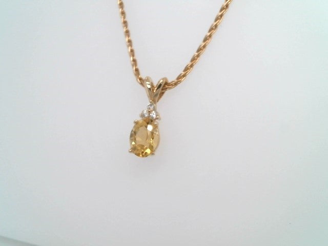 14 Karat Yellow Gold Oval Heliodore Pendant With Diamond Accents
