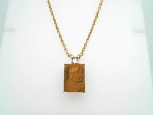 14 Karat Yellow Gold Rectangular Carved Tiger's Eye Inaglio Pendant With Diamond Accent