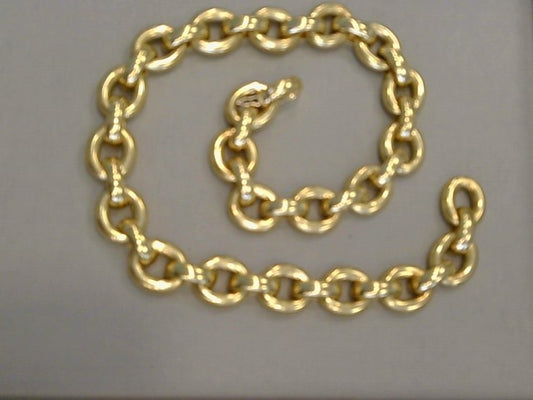 18KYG 18 inch oval fully rounded semi solid links connected by fully rounded half oval links with securing flat back design. Having  fold over clasp with safety figure 8 clasp.