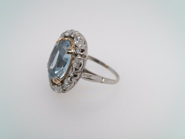 Vintage Platinum & 14 Karat Yellow Gold Oval Light Blue Synthetic Spinel Ring With Marquise & Round Brilliant Diamond Halo