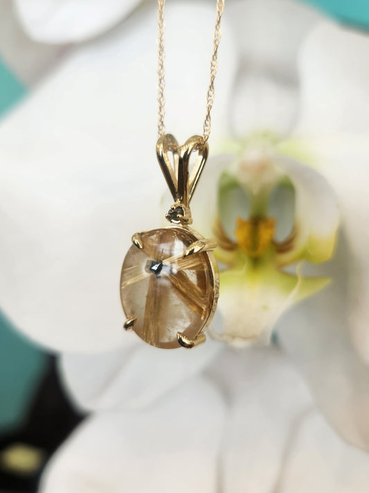 14 Karat Yellow Gold Starburst Pattern Rutilated Quartz With Rough Gray Diamond Accent