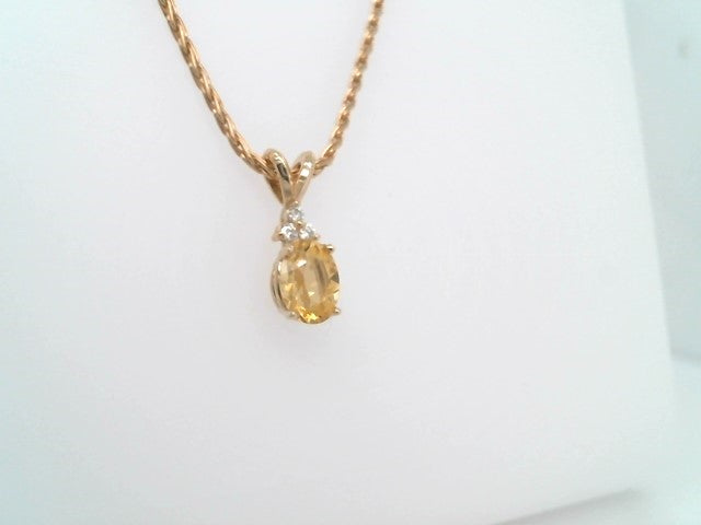 14 Karat Yellow Gold Oval Heliodore Pendant With Diamond Accents