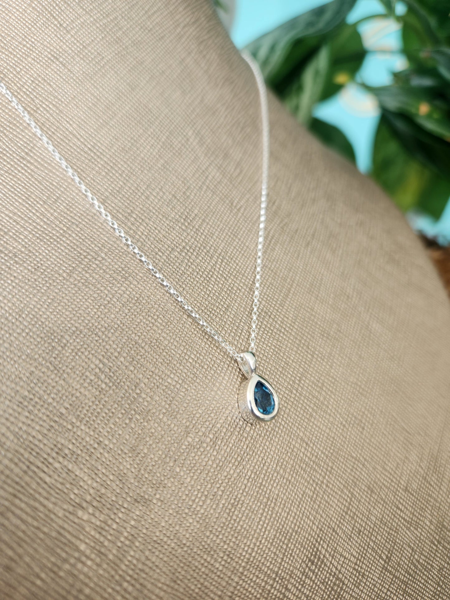 Sterling Silver Bezel Set Pear Blue Topaz Solitaire Pendant