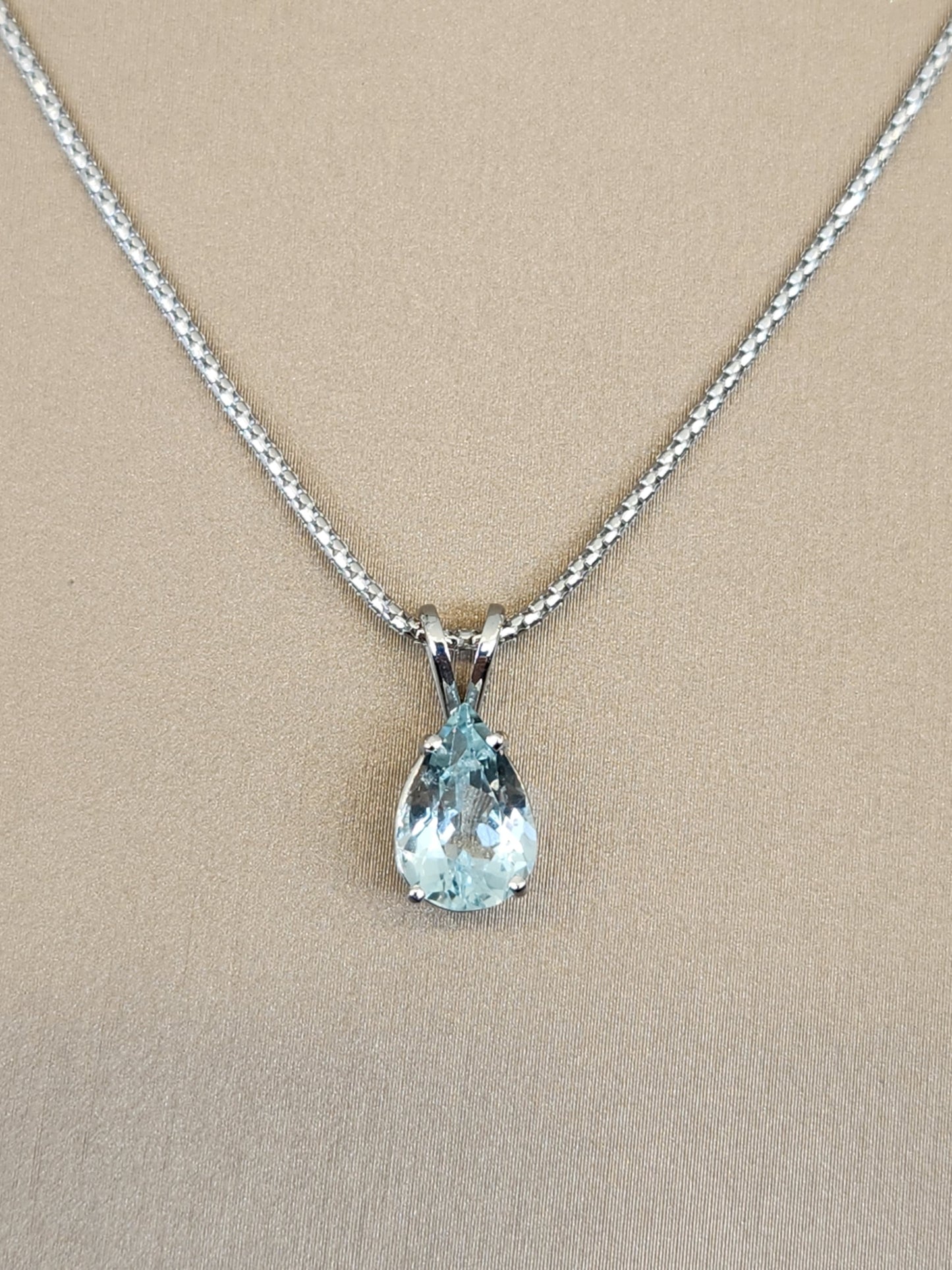 14 Karat White Gold Pear Shaped Aquamarine Solitaire Pendant