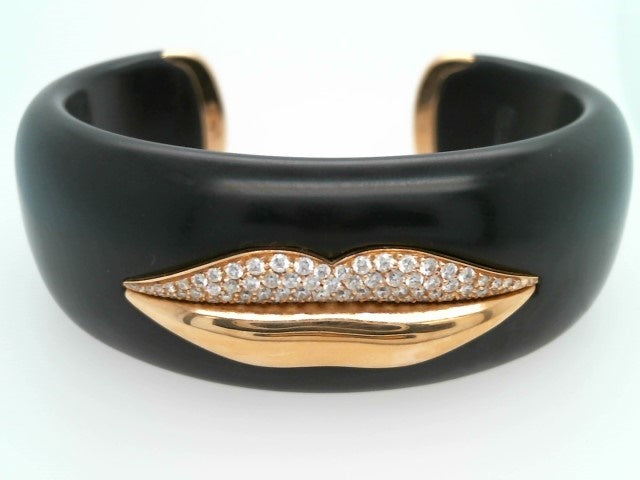 Vintage 18 Karat Yellow Gold Gianni Bvlgari Enigma Collection Jet Wood Bangle With A Pair Of Diamond Encrusted Lips