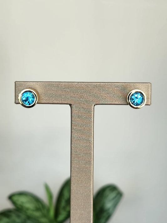 Vintage 14 Karat Yellow Gold Round Bezel Set Blue Topaz Earrings With Omega Backs