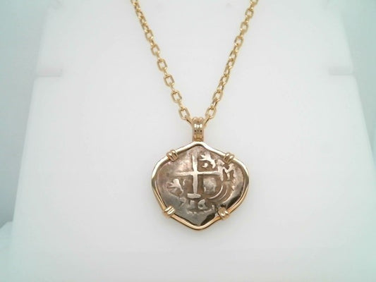 Silver 2 Reale Coin Prong Set In 14 Karat Yellow Gold Bezel Pendant
D