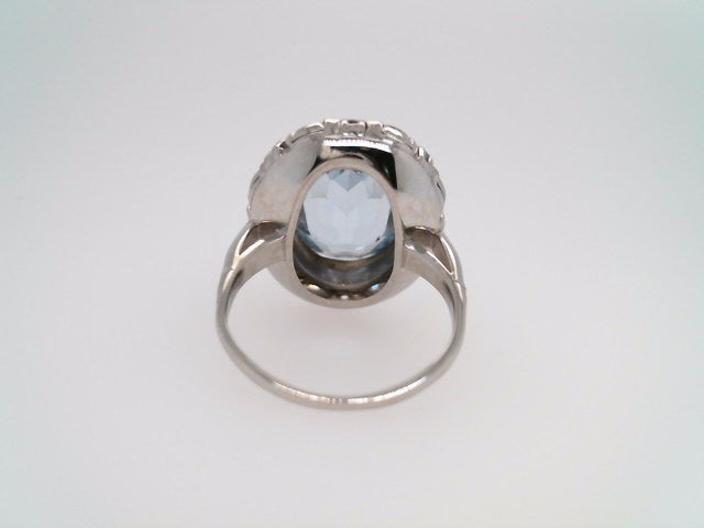 Vintage Platinum & 14 Karat Yellow Gold Oval Light Blue Synthetic Spinel Ring With Marquise & Round Brilliant Diamond Halo