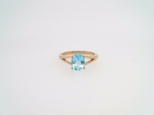 14 Karat Yellow Gold Blue Topaz Ring With Split Shank