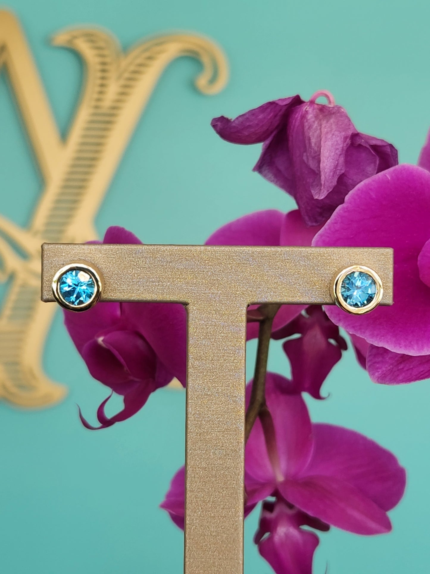 Vintage 14 Karat Yellow Gold Round Bezel Set Blue Topaz Earrings With Omega Backs