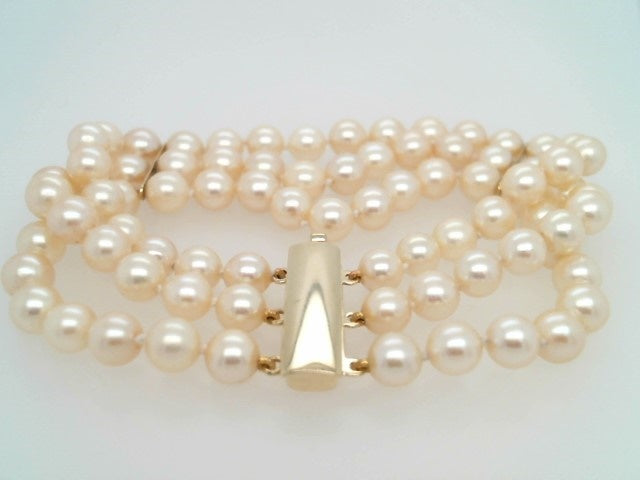 14 Karat Yellow Gold Triple Strand Akoya Cultured Pearl Bracelet, 7"