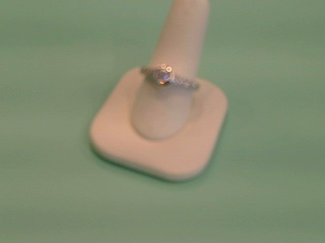 18 Karat White Gold Diamond Engagement Ring With Bezel Set Diamond