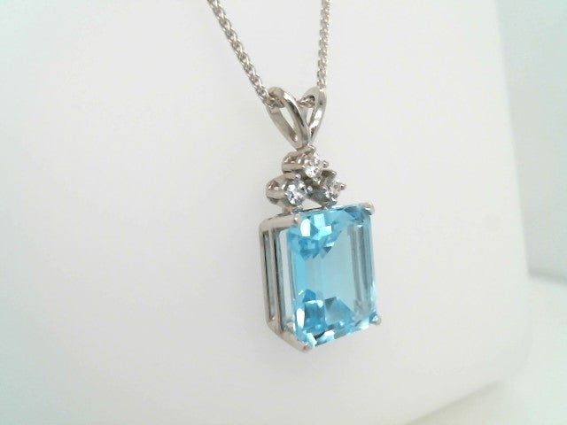 14 Karat White Gold Emerald Cut Blue Topaz & Diamond Pendant